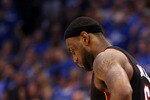 DALLAS, TX - JUNE 09:  LeBron James #6 of the Miami Heat stands on the court with his head down against the Dallas Mavericks in the fourth quarter of Game Five of the 2011 NBA Finals at American Airlines Center on June 9, 2011 in Dallas, Texas.  NOTE TO USER: User expressly acknowledges and agrees that, by downloading and/or using this Photograph, user is consenting to the terms and conditions of the Getty Images License Agreement.  (Photo by Mike Ehrmann/Getty Images)