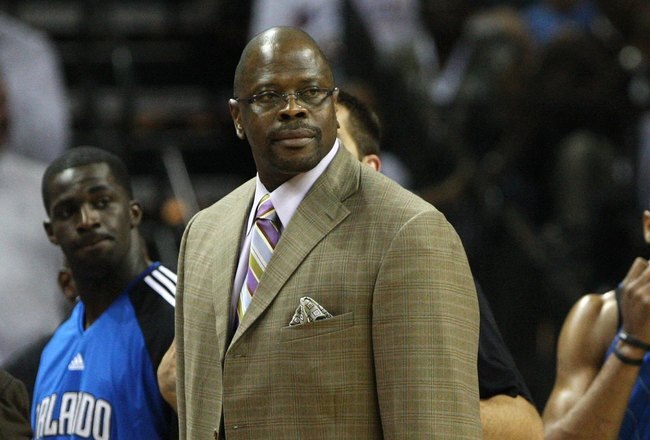 CHARLOTTE - APRIL 24:  Assistant coach Patrick Ewing (C) of the Orlando Magic looks at the referee (not pictured) during a timeout in Game Three of the Eastern Conference Quarterfinals against the Charlotte Bobcats during the 2010 NBA Playoffs at Time Warner Cable Arena on April 24, 2010 in Charlotte, North Carolina. NOTE TO USER: User expressly acknowledges and agrees that, by downloading and/or using this photograph, user is consenting to the terms and conditions of the Getty Images License Agreement.  The Magic beat the Bobcats 90-86.  (Photo by Mike Zarrilli/Getty Images)