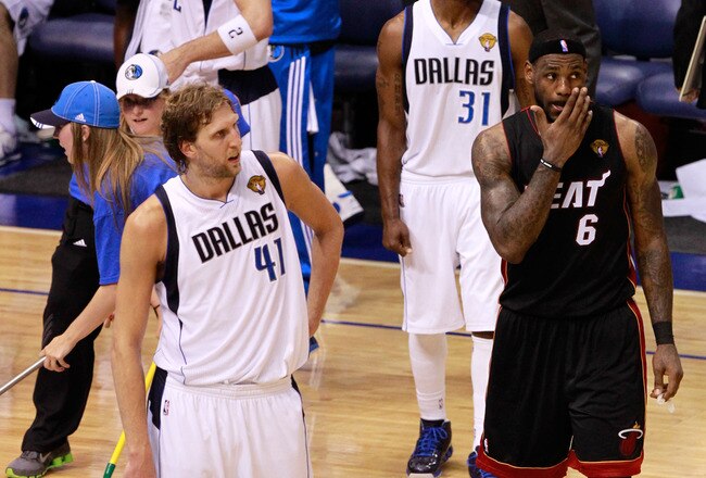 DALLAS, TX - JUNE 09:  Dirk Nowitzki #41 of the Dallas Mavericks and LeBron James #6 of the Miami Heat look on in Game Five of the 2011 NBA Finals at American Airlines Center on June 9, 2011 in Dallas, Texas.  NOTE TO USER: User expressly acknowledges and agrees that, by downloading and/or using this Photograph, user is consenting to the terms and conditions of the Getty Images License Agreement.  (Photo by Tom Pennington/Getty Images)