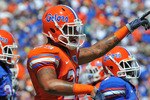 GAINESVILLE, FL - APRIL 9:  Defensive end Chris Martin #23 of the Florida Gators sets for play during the Orange and Blue spring football game April 9, 2011 at Ben Hill Griffin Stadium in Gainesville, Florida.  (Photo by Al Messerschmidt/Getty Images)