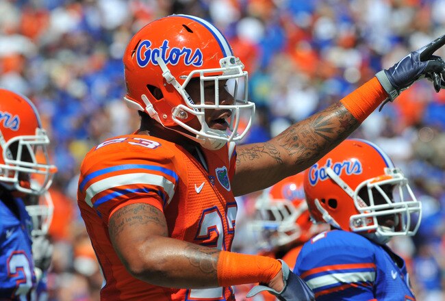 GAINESVILLE, FL - APRIL 9:  Defensive end Chris Martin #23 of the Florida Gators sets for play during the Orange and Blue spring football game April 9, 2011 at Ben Hill Griffin Stadium in Gainesville, Florida.  (Photo by Al Messerschmidt/Getty Images)