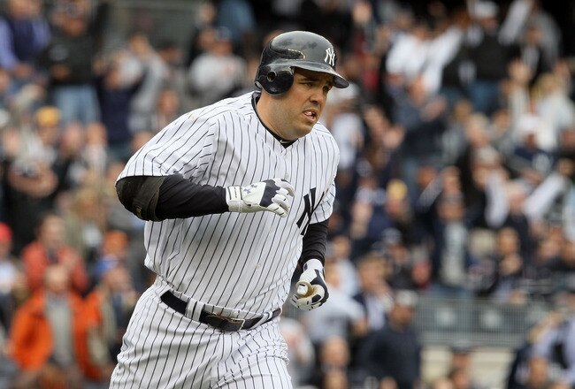 NEW YORK - APRIL 13:  Nick Johnson #26 of the New York Yankees runs the bases on a solo home run in the bottom of the firts inning against the Los Angeles Angels of Anaheim during the Yankees home opener at Yankee Stadium on April 13, 2010 in the Bronx borough of New York City.  (Photo by Jim McIsaac/Getty Images)