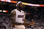 MIAMI, FL - JUNE 12:  LeBron James #6 of the Miami Heat reacts against the Dallas Mavericks in Game Six of the 2011 NBA Finals at American Airlines Arena on June 12, 2011 in Miami, Florida. NOTE TO USER: User expressly acknowledges and agrees that, by downloading and/or using this Photograph, user is consenting to the terms and conditions of the Getty Images License Agreement.  (Photo by Ronald Martinez/Getty Images)