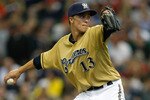 MILWAUKEE, WI - JUNE 11: Zach Greinke #13 of the Milwaukee Brewers pitches against the St. Louis Cardinals at the Miller Park on June 11, 2011 in Milwaukee, Wisconsin. (Photo by Scott Boehm/Getty Images)