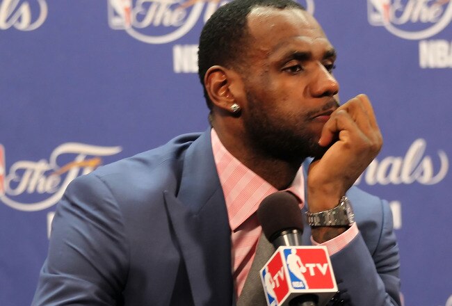 MIAMI, FL - JUNE 12:  LeBron James #6 of the Miami Heat answers questions after the Heat were defeated 105-95 by the Dallas Mavericks in Game Six of the 2011 NBA Finals at American Airlines Arena on June 12, 2011 in Miami, Florida. NOTE TO USER: User expressly acknowledges and agrees that, by downloading and/or using this Photograph, user is consenting to the terms and conditions of the Getty Images License Agreement.  (Photo by Mike Ehrmann/Getty Images)
