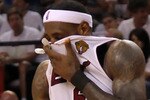 MIAMI, FL - JUNE 12:  LeBron James #6 of the Miami Heat reacts in the fourth quarter while taking on the Dallas Mavericks in Game Six of the 2011 NBA Finals at American Airlines Arena on June 12, 2011 in Miami, Florida. NOTE TO USER: User expressly acknowledges and agrees that, by downloading and/or using this Photograph, user is consenting to the terms and conditions of the Getty Images License Agreement.  (Photo by Mike Ehrmann/Getty Images)