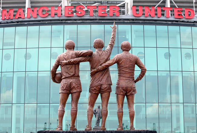 MANCHESTER, UNITED KINGDOM - MAY 29:  The statue of Manchester United's 'Holy Trinity' of players stands in front of Old Trafford and the Matt Busby statue after being unveiled today on May 29, 2008, Manchester, England. The statue of United legends Bobby Charlton, Denis Law and the late George Best comes 40 years to the day since the club first lifted the European Cup. Charlton, Best and Law scored 665 goals between them for United and between 1964 and 1968, all won the coveted European Footballer of the Year award.  (Photo by Christopher Furlong/Getty Images)