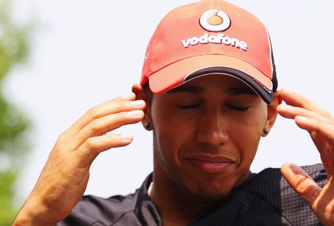 MONTREAL, CANADA - JUNE 09:  Lewis Hamilton of Great Britain and McLaren is interviewed in the paddock during previews to the Canadian Formula One Grand Prix at the Circuit Gilles Villeneuve on June 9, 2011 in Montreal, Canada.  (Photo by Clive Rose/Getty Images)