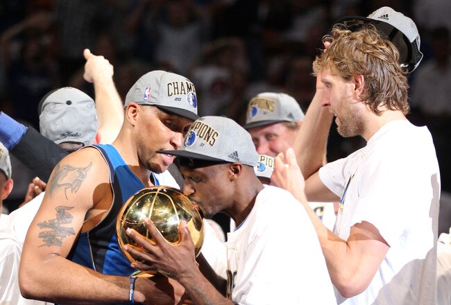 MIAMI, FL - JUNE 12:  Jason Terry #31 of the Dallas Mavericks kisses the Larry O'Brien trophy as he celebrates with Shawn Marion #0 after the Mavericks won 105-95 against the Miami Heat in Game Six of the 2011 NBA Finals at American Airlines Arena on June 12, 2011 in Miami, Florida. NOTE TO USER: User expressly acknowledges and agrees that, by downloading and/or using this Photograph, user is consenting to the terms and conditions of the Getty Images License Agreement.  (Photo by Mike Ehrmann/Getty Images)