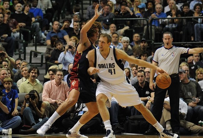 DALLAS - NOVEMBER 03:  Forward Dirk Nowitzki #41 of the Dallas Mavericks moves the ball against Anderson Varejao #17 of the Cleveland Cavaliers on November 3, 2008 at American Airlines Center in Dallas, Texas.  NOTE TO USER: User expressly acknowledges and agrees that, by downloading and/or using this Photograph, user is consenting to the terms and conditions of the Getty Images License Agreement.  (Photo by Ronald Martinez/Getty Images)