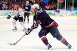 VANCOUVER, BC - FEBRUARY 24:  Chris Drury #23 of the United States handles the puck during the ice hockey men's quarter final game between USA and Switzerland on day 13 of the Vancouver 2010 Winter Olympics at Canada Hockey Place on February 24, 2010 in Vancouver, Canada.  (Photo by Kevork Djansezian/Getty Images)