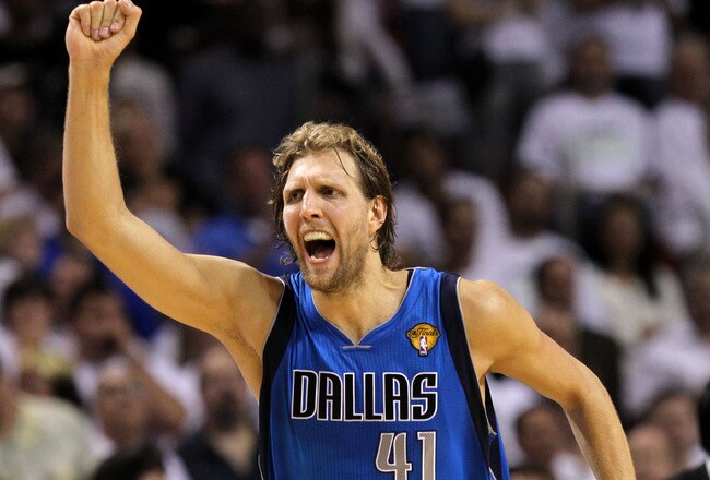 MIAMI, FL - JUNE 12:  Dirk Nowitzki #41 of the Dallas Mavericks reacts after making a three-pointer in the fourth quarter while taking on the Miami Heat in Game Six of the 2011 NBA Finals at American Airlines Arena on June 12, 2011 in Miami, Florida. NOTE TO USER: User expressly acknowledges and agrees that, by downloading and/or using this Photograph, user is consenting to the terms and conditions of the Getty Images License Agreement.  (Photo by Ronald Martinez/Getty Images)