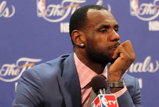 MIAMI, FL - JUNE 12:  LeBron James #6 of the Miami Heat answers questions after the Heat were defeated 105-95 by the Dallas Mavericks in Game Six of the 2011 NBA Finals at American Airlines Arena on June 12, 2011 in Miami, Florida. NOTE TO USER: User expressly acknowledges and agrees that, by downloading and/or using this Photograph, user is consenting to the terms and conditions of the Getty Images License Agreement.  (Photo by Mike Ehrmann/Getty Images)