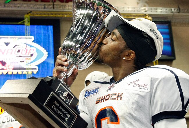 LAS VEGAS - AUGUST 22:  Stanley Franks #6 of the Spokane Shock kisses the trophy after the Shock defeated the Wilkes-Barre/Scranton Pioneers 74-27 in the AFL2 ArenaCup 10 at the Orleans Arena August 22, 2009 in Las Vegas, Nevada.  (Photo by Ethan Miller/Getty Images)