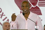 CANASTOTA, NY - JUNE 12:  Mike Tyson gives his induction speech during the 2011 International Boxing Hall of Fame Inductions at the International Boxing Hall of Fame on June 12, 2011 in Canastota, New York.  (Photo by Rick Stewart/Getty Images)