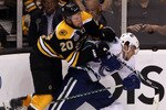 BOSTON, MA - JUNE 13:  Daniel Paille #20 of the Boston Bruins checks Chris Tanev #18 of the Vancouver Canucks during Game Six of the 2011 NHL Stanley Cup Final at TD Garden on June 13, 2011 in Boston, Massachusetts.  (Photo by Bruce Bennett/Getty Images)