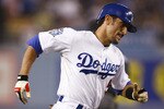 LOS ANGELES, CA - SEPTEMBER 23:  Nomar Garciaparra #5 of the Los Angeles Dodgers runs the bases after hitting a three-run home run in the first inning against the San Diego Padres  at Dodger Stadium September 23, 2008 in Los Angeles, California. (Jeff Gross/Getty Images)