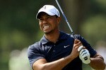 PONTE VEDRA BEACH, FL - MAY 12:  Tiger Woods reacts to his approach shot on the ninth hole during the first round of THE PLAYERS Championship held at THE PLAYERS Stadium course at TPC Sawgrass on May 12, 2011 in Ponte Vedra Beach, Florida. Woods withdrew after shooting a 42 on the front nine holes.  (Photo by Streeter Lecka/Getty Images)