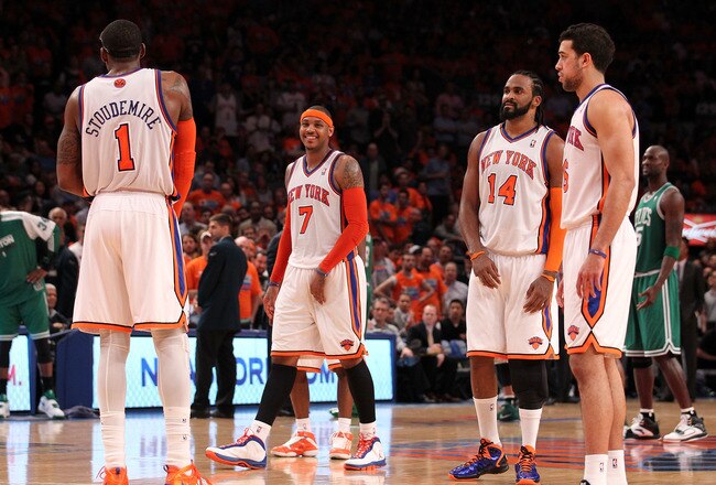 NEW YORK, NY - APRIL 24:  (L-R) Amar'e Stoudemire #1, Carmelo Anthony #7, Ronny Turiaf #14 and Landry Fields #6 of the New York Knicks look on against the Boston Celtics in Game Four of the Eastern Conference Quarterfinals during the 2011 NBA Playoffs on April 24, 2011 at Madison Square Garden in New York City. The Celtics won 101-89. NOTE TO USER: User expressly acknowledges and agrees that, by downloading and or using this photograph, User is consenting to the terms and conditions of the Getty Images License Agreement  (Photo by Nick Laham/Getty Images)