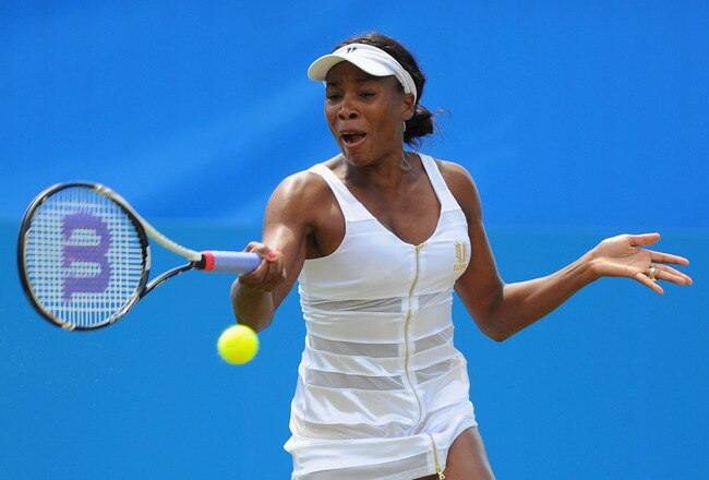 EASTBOURNE, ENGLAND - JUNE 15:  Venus Williams of USA in action against Ana Ivanovic of Serbia during day five of the AEGON International at Devonshire Park on June 15, 2011 in Eastbourne, England.  (Photo by Mike Hewitt/Getty Images)
