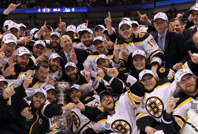 VANCOUVER, BC - JUNE 15:  The Boston Bruins pose with the Stanley Cup after defeating the Vancouver Canucks in Game Seven of the 2011 NHL Stanley Cup Final at Rogers Arena on June 15, 2011 in Vancouver, British Columbia, Canada. The Boston Bruins defeated the Vancouver Canucks 4 to 0.  (Photo by Bruce Bennett/Getty Images)
