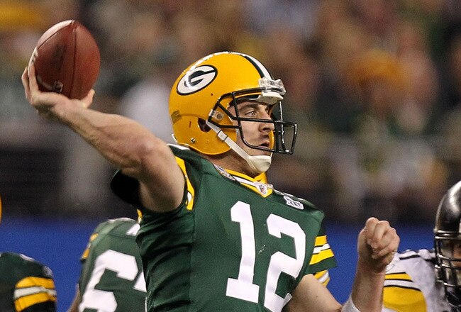 ARLINGTON, TX - FEBRUARY 06:  Aaron Rodgers #12 of the Green Bay Packers throws a pass against the Pittsburgh Steelers during Super Bowl XLV at Cowboys Stadium on February 6, 2011 in Arlington, Texas.  (Photo by Ronald Martinez/Getty Images)
