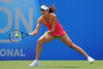 EASTBOURNE, ENGLAND - JUNE 14:  Ana Ivanovic of Serbia in action against Julia Goerges of Germany during day four of the AEGON International at Devonshire Park on June 14, 2011 in Eastbourne, England.  (Photo by Mike Hewitt/Getty Images)