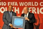 SOWETO, SOUTH AFRICA - DECEMBER 13: South Africa President Jacob Zuma (L) and FIFA President Sepp Blatter pose together during a media briefing at Soccer City on December 13, 2010 in Soweto, South Africa. The event was held to reflect on the legacy of the 2010 FIFA World Cup. (Photo by Gallo Images/Getty Images)