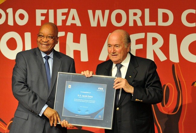 SOWETO, SOUTH AFRICA - DECEMBER 13: South Africa President Jacob Zuma (L) and FIFA President Sepp Blatter pose together during a media briefing at Soccer City on December 13, 2010 in Soweto, South Africa. The event was held to reflect on the legacy of the 2010 FIFA World Cup. (Photo by Gallo Images/Getty Images)