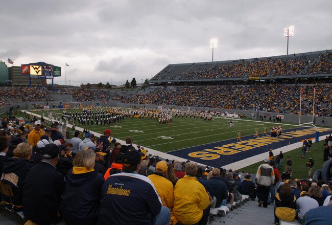 MORGANTOWN, WV - OCTOBER 26:  The West Virginia University Mountaineers marching band performs during a Big East game against the University of Miami Hurricanes on October 26, 2002 at Mountaineer Field in Morgantown, West Virginia . Miami won 40-23.  (Photo By Doug Pensinger/Getty Images)