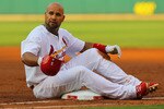 ST. LOUIS, MO - MAY 31: Albert Pujols #5 of the St. Louis Cardinals reacts after being tagged out at first base against the San Francisco Giants at Busch Stadium on May 31, 2011 in St. Louis, Missouri.  (Photo by Dilip Vishwanat/Getty Images)