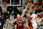 GREENSBORO, NC - MARCH 11:  David Potter #15 of the Clemson Tigers shoots over Jordan Vandenberg #14 and Julius Mays #24 of the NC State Wolfpack in their first round game in the 2010 ACC Men's Basketball Tournament at the Greensboro Coliseum on March 11, 2010 in Greensboro, North Carolina.  (Photo by Jeff Zelevansky/Getty Images)