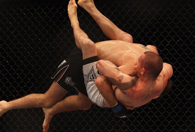 SYDNEY, AUSTRALIA - FEBRUARY 27:  Riki Fukuda of Japan drives Nick Ring of Canada into the ground during their middleweight boutat UFC 127 at Acer Arena on February 27, 2011 in Sydney, Australia.  (Photo by Mark Kolbe/Getty Images)