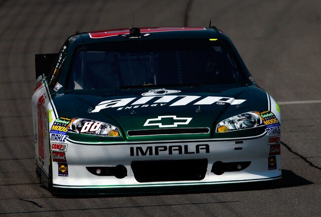 BROOKLYN, MI - JUNE 18:  Dale Earnhardt Jr., driver of the #88 Amp Energy/National Guard Chevrolet, qualifies for the NASCAR Sprint Cup Series Heluva Good! Sour Cream Dips 400 at Michigan International Speedway on June 18, 2011 in Brooklyn, Michigan.  (Photo by Tom Pennington/Getty Images)