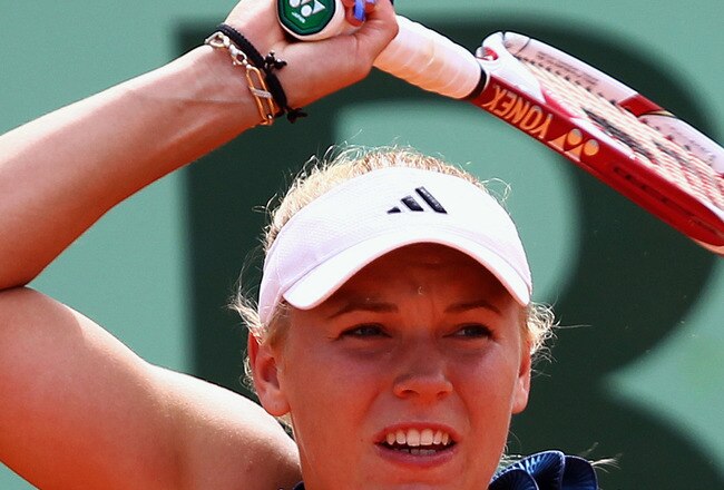 PARIS, FRANCE - MAY 27:  Caroline Wozniacki of Denmark hits a forehand during the women's singles round three match between Caroline Wozniacki of Denmark and Daniela Hantuchova of Slovakia on day six of the French Open at Roland Garros on May 27, 2011 in Paris, France.  (Photo by Clive Brunskill/Getty Images)