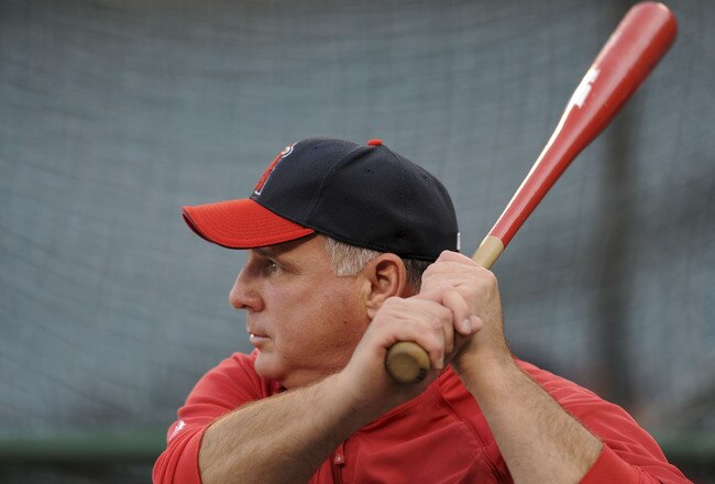 ANAHEIM, CA - OCTOBER 09:  Mike Scioscia #14 manager of theLos Angeles Angels of Anaheim participates in batting practice before Game Two of the ALDS against the Boston Red Sox during the 2009 MLB Playoffs at Angel Stadium on October 9, 2009 in Anaheim, California.  (Photo by Lisa Blumenfeld/Getty Images)