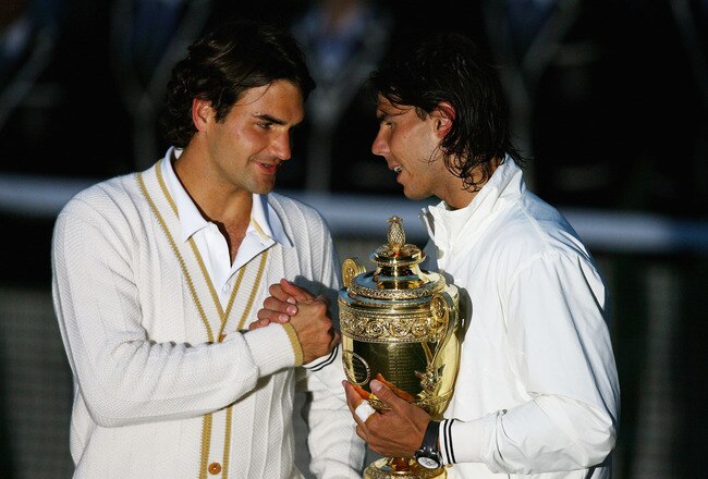 LONDON - JULY 06:  Roger Federer of Switzerland congratulates Rafael Nadal of Spain in winning the Championship trophy during the men's singles Final on day thirteen of the Wimbledon Lawn Tennis Championships at the All England Lawn Tennis and Croquet Club on July 6, 2008 in London, England.  (Photo by Julian Finney/Getty Images)