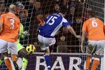 BLACKPOOL, ENGLAND - JANUARY 04:  Scott Dann of Birmingham City scores the winning goal during the Barclays Premier League match between Blackpool and Birmingham City at Bloomfield Road on January 4, 2011 in Blackpool, England.  (Photo by Alex Livesey/Getty Images)