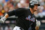 NEW YORK - SEPTEMBER 18:  Lucas Duda #21 of the New York Mets runs against the Atlanta Braves on September 18, 2010 at Citi Field in the Flushing neighborhood of the Queens borough of New York City.  (Photo by Andrew Burton/Getty Images)