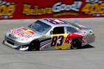 BROOKLYN, MI - JUNE 17:  Brian Vickers, driver of the #83 Red Bull Toyota, practices for the NASCAR Sprint Cup Series Heluva Good! Sour Cream Dips 400 at Michigan International Speedway on June 17, 2011 in Brooklyn, Michigan.  (Photo by Geoff Burke/Getty Images for NASCAR)