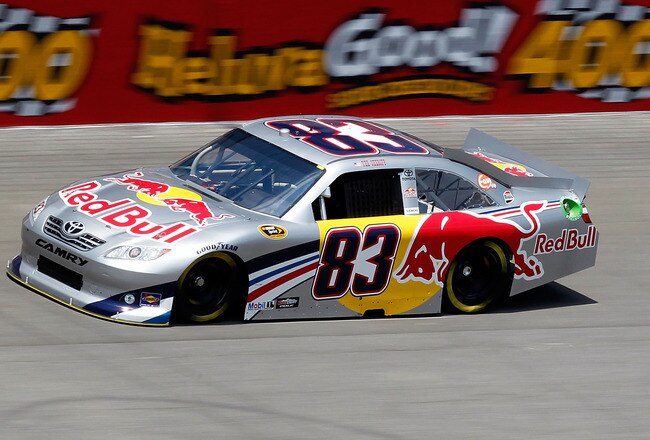 BROOKLYN, MI - JUNE 17:  Brian Vickers, driver of the #83 Red Bull Toyota, practices for the NASCAR Sprint Cup Series Heluva Good! Sour Cream Dips 400 at Michigan International Speedway on June 17, 2011 in Brooklyn, Michigan.  (Photo by Geoff Burke/Getty Images for NASCAR)