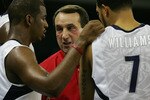 MACAU, CHINA - AUGUST 01:  Head coach Mike Krzyzewski talks with Chris Paul #13 and Deron Williams #7 of the USA Basketball Men's Senior National Team during the USA Basketball International Challenge exhibition game against the Turkey National Team at the Coati Strip Cotai Arena August 1, 2008 in Macau, China.  (Photo by MN Chan/Getty Images)