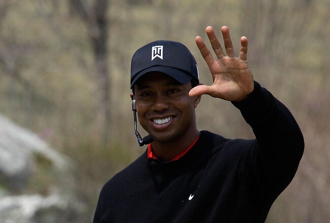 CHUNCHEON, SOUTH KOREA - APRIL 14:  U.S. golfer Tiger Woods participates in a golf teaching clinic for South Korean juniors during a Nike Golf 'Make It Happen' event at Jade Palace Golf Club on April 14, 2011 in Chuncheon, South Korea.  (Photo by Chung Sung-Jun/Getty Images)