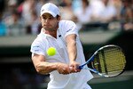 LONDON, ENGLAND - JUNE 21:  Andy Roddick of the United States returns a shot during his first round match against Andreas Beck of Germany on Day Two of the Wimbledon Lawn Tennis Championships at the All England Lawn Tennis and Croquet Club on June 21, 2011 in London, England.  (Photo by Clive Mason/Getty Images)