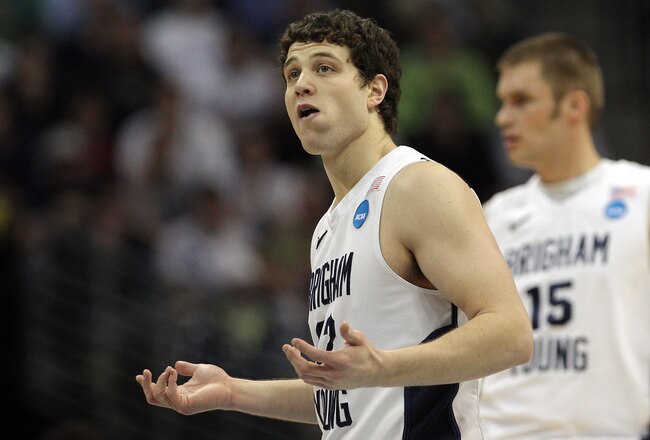 DENVER, CO - MARCH 17:  Jimmer Fredette #32 of the Brigham Young Cougars reacts while playing against the Wofford Terriers during the second round of the 2011 NCAA men's basketball tournament at Pepsi Center on March 17, 2011 in Denver, Colorado.  (Photo by Justin Edmonds/Getty Images)