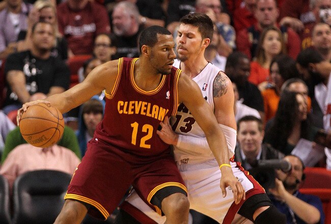 MIAMI, FL - JANUARY 31: Joey Graham #12 of the Cleveland Cavaliers posts up Mike Miller #13 of the Miami Heat  during a game at American Airlines Arena on January 31, 2011 in Miami, Florida. NOTE TO USER: User expressly acknowledges and agrees that, by downloading and/or using this Photograph, User is consenting to the terms and conditions of the Getty Images License Agreement.  (Photo by Mike Ehrmann/Getty Images)