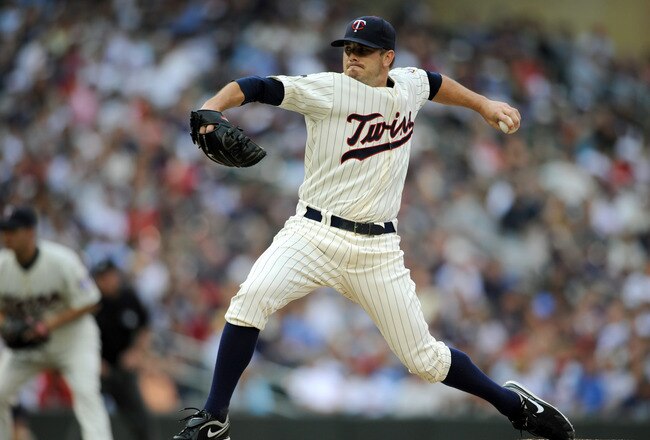 MINNEAPOLIS, MN - JUNE 17: Brian Duensing #52 of the Minnesota Twins delivers a pitch against the San Diego Padres in the first inning on June 17, 2011 at Target Field in Minneapolis, Minnesota. (Photo by Hannah Foslien/Getty Images)