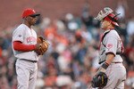 SAN FRANCISCO, CA - JUNE 12:  Ramon Hernandez #55 of the Cincinnati Reds talks to pitcher Jose Arredondo #33 of the Cincinnati Reds in the seventh inning of their game against the San Francisco Giants at AT&T Park on June 12, 2011 in San Francisco, California.  (Photo by Ezra Shaw/Getty Images)