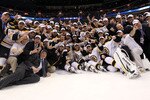 VANCOUVER, BC - JUNE 15:  The Boston Bruins pose with the Stanley Cup after defeating the Vancouver Canucks in Game Seven of the 2011 NHL Stanley Cup Final at Rogers Arena on June 15, 2011 in Vancouver, British Columbia, Canada. The Boston Bruins defeated the Vancouver Canucks 4 to 0.  (Photo by Bruce Bennett/Getty Images)