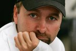 LAS VEGAS - JULY 30:  Poker player Daniel Negreanu looks up as he competes on the third day of the first round of the World Series of Poker no-limit Texas Hold 'em main event at the Rio Hotel & Casino July 30, 2006 in Las Vegas, Nevada. More than 8,600 players have registered to play in the main event. The final nine players will compete for the top prize of more than USD 11.7 million on the final table which begins August 10.  (Photo by Ethan Miller/Getty Images)